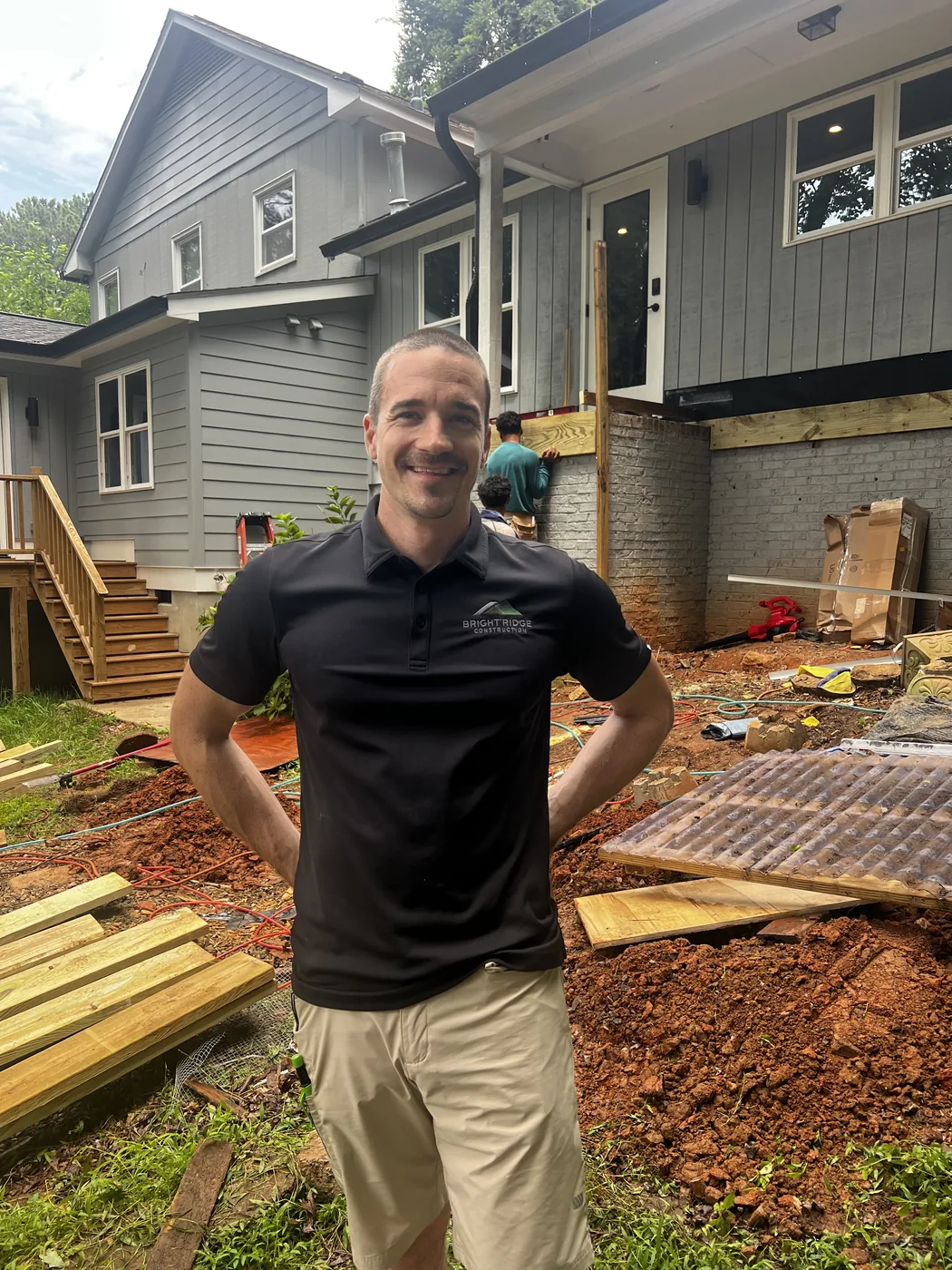 Sam Ridge, owner of Bright Ridge Construction, on site during a backyard deck build in Wake Forest, NC
